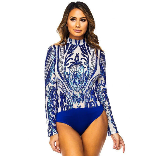 a woman in a skirt sitting on a bench