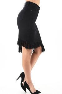 a woman in a black shirt is playing tennis