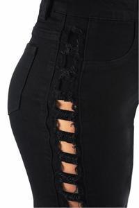 a person standing in front of a tall building