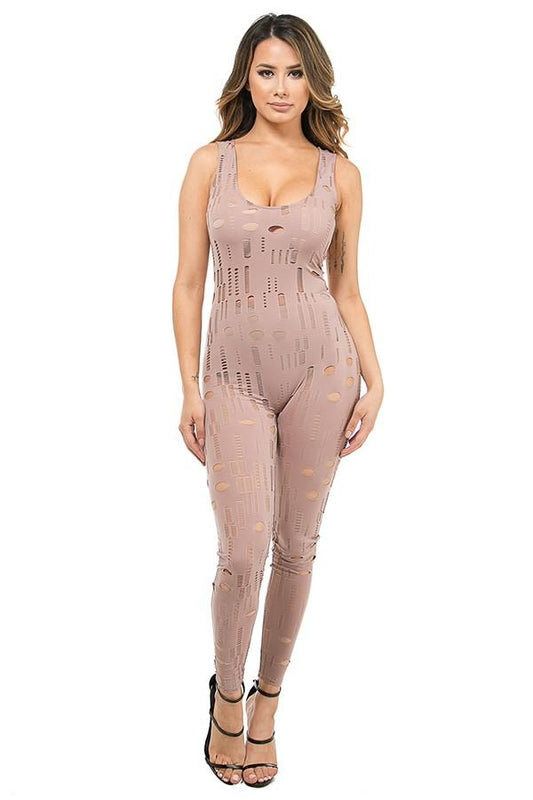 a woman in a pink dress holding a tennis racquet