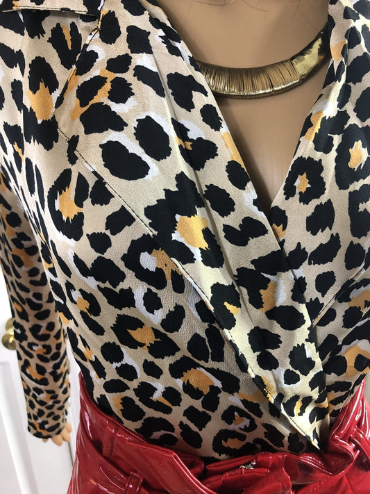 a woman in a striped shirt with a tie