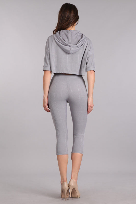 a woman in a bikini standing on a beach