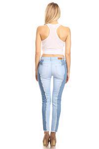 a woman in a skirt holding a tennis racquet